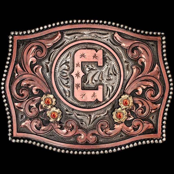 The Mayfield is a stunnin' buckle to display your initial or ranch brand. Crafted on a hand-engraved, German Silver base with our signature antique finish. Detailed with a beaded German Silver edge, Copper scrolls and Jeweler's Bronze lettering. 

